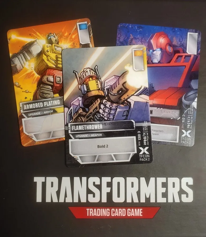 Armored Plating, Flamethrower, and Ready for Action Electrum battle cards