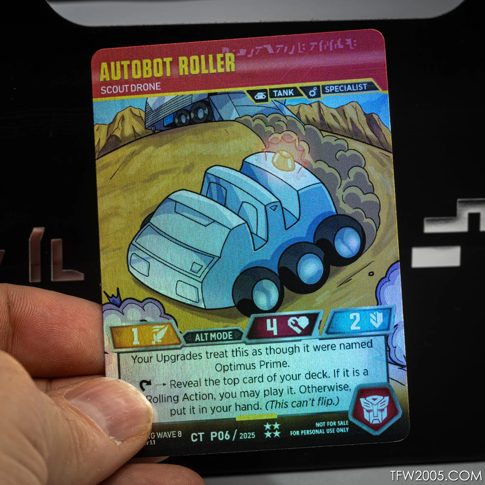 Limited chibi Autobot Roller // Scout Drone promo card from transformerstcg.org