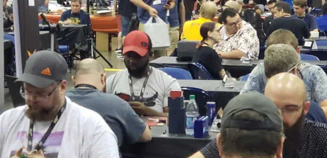 2019 Origins Open Champion, Steffon Pinckney (Red Hat), battling in the Top 32 at Gen Con