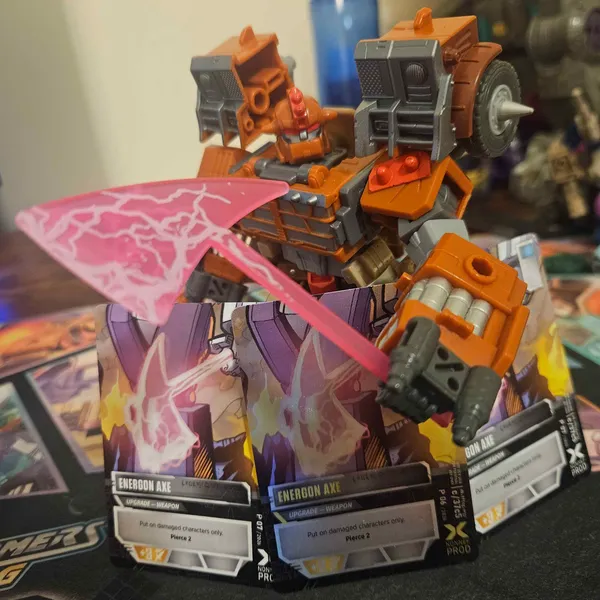 Trashmaster with an Energon Axe and a cordon of Energon Axe Electrum cards